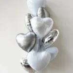 Amina | ten heart shaped white foil balloons