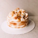 Passionfruit cloud cake | vanilla chiffon cake with passionfruit cream, covered in toasted meringue | 7 inches in diameter