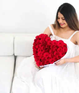 Gift your loved one 50 red roses in a heart-shaped box