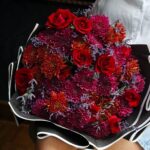 Give your loved ones a beautiful flower bouquet, with red roses and chrysanthemum including wrapping.