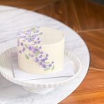 Please note the flavor profile of your choice at checkout: ribbon cake , ribbon almond the cake has dimensions of 6 inches in diameter and 4-5 inches in height