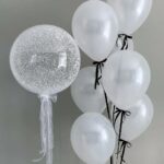 Create a memorable balloon arrangement for your special occasion! 1 bubble balloon with 7 latex balloons color theme can be customized