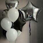 Create a memorable balloon arrangement for your special occasion! Giant personalized star foil balloon, 8 latex balloons, 1 heart foil balloon, and 1 star foil balloon color theme can be customized