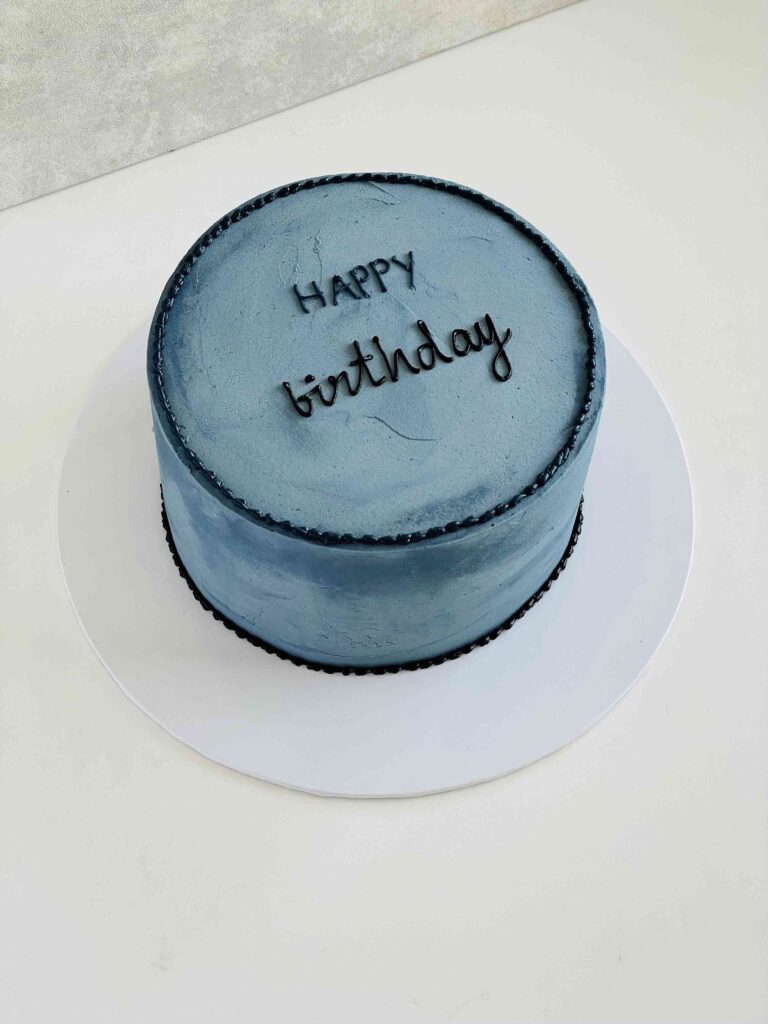 Blue color 1kg cake with happy birthday written