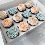 12 delicious cupcakes box in pink and blue pastel colors