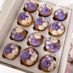 12 delicious cupcakes box in purple and white color